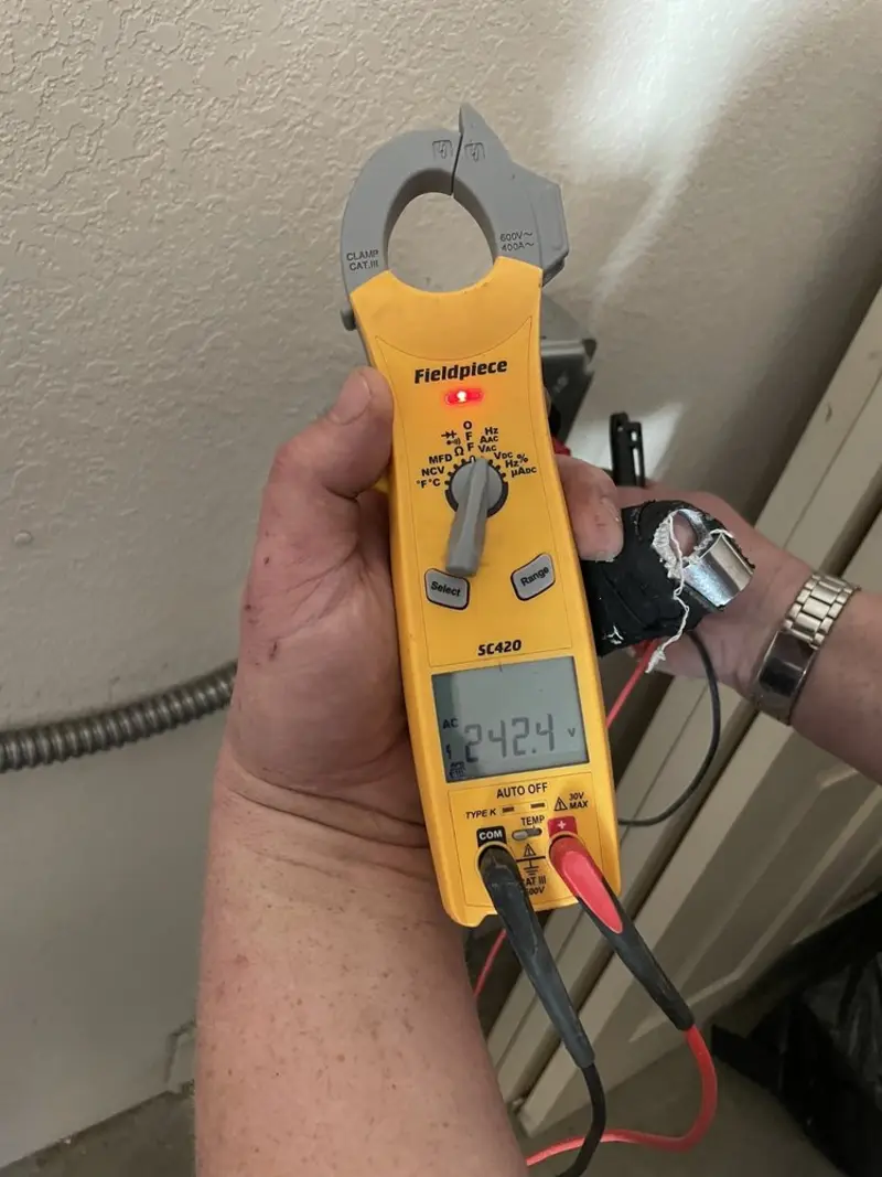 Voltage testing with clamp meter during Aluminum Wiring Replacement in Bossier City